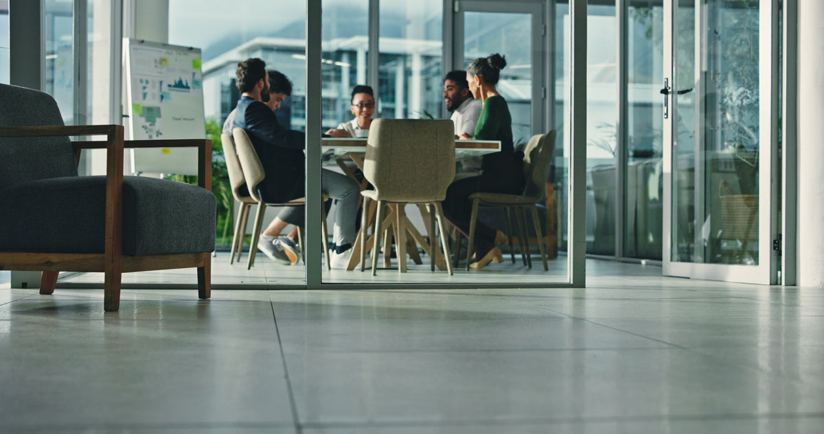 Professionals meeting to discuss a workplace matter